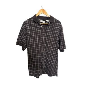 Grand Slam Black Polo Shirt with Checkered Pattern